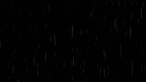 Long drops of rain fall down on a black background. A dreary evening. Stock Footage 156311578