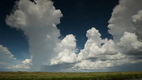 Long-duration thunderstorm time lapse with developing clouds into mature storms. Stock Footage 240775114