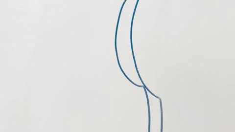 A long electrical wire sticks out of a white wall during a renovation. Stock Footage 246956471