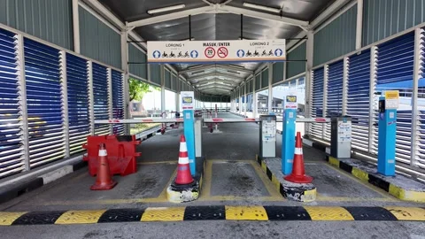 Long, empty, and empty road at entrance of motorcycle for Ferry Penang Stock Footage 332151394