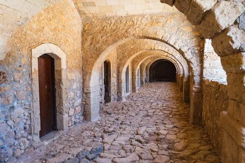 A long, empty corridor in a historic building Stock Photos