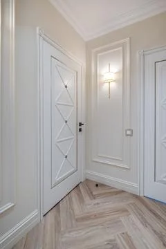 Long empty corridor in interior of entrance hall of modern apartments, office Stock Photos