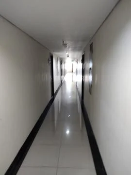 Long Empty Hallway Corridor with Glossy Floor and Doors, Building Stock Photos