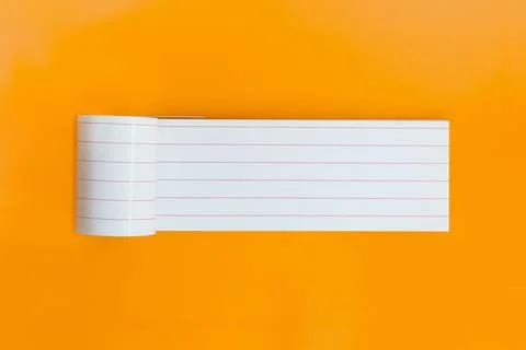 Long empty notebook for text on orange background. Open planner sheet, reminder Stock Photos