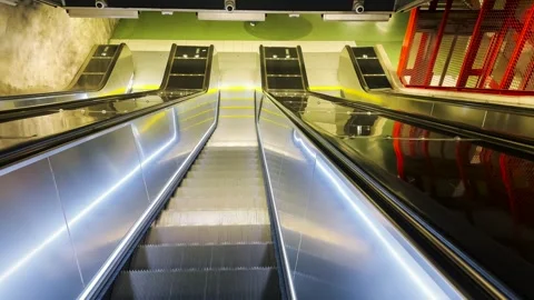 Long escalator in train station and shopping mall. Escalator moving slowly. Stock Footage 280259926