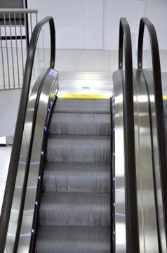 Long escalators in shopping centre Stock Photos