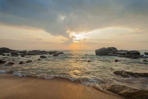 Long exposure capture with beach, reef and rocks.. Stock Photos