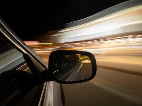  long exposure driving through Perth city at night from car window side view  Stock Photos
