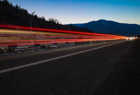 Long exposure of light trails of passing cars Stock Photos