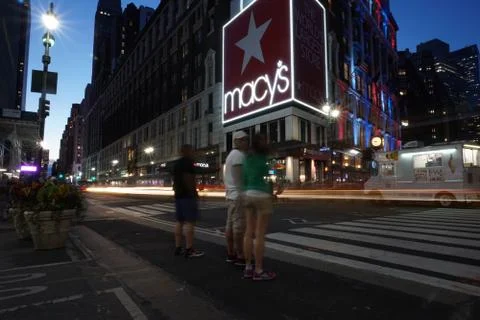 Long exposure light train outside Macy's store Stock Photos