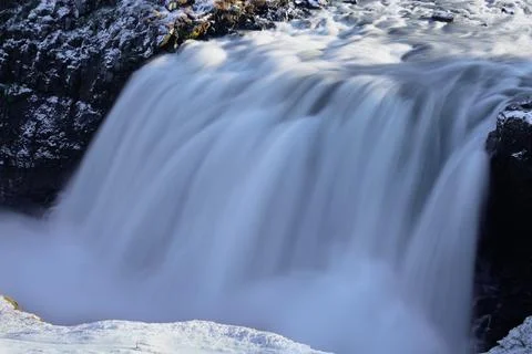 Long exposure of massive waterfall on winter Foto stock