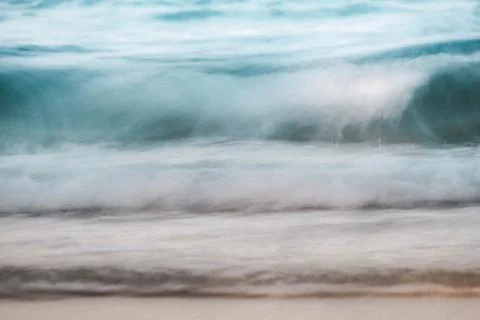 Long exposure of motion wave in sunset along the sunshine coast background Stock Photos