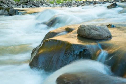 Long exposure of a small stream in the mountains, close up Stock Photos