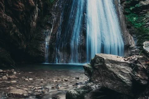 Long exposure on a small waterfall Stock Photos