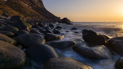 Long exposure sunset hyperlapse at Uttakleiv Beach facing south Stock Footage 112718533