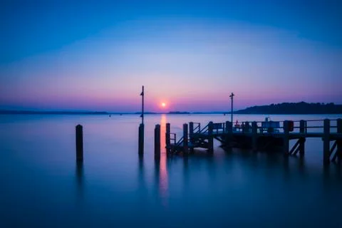 Long Exposure Sunset over Jetty in Poole Harbour Stock Photos