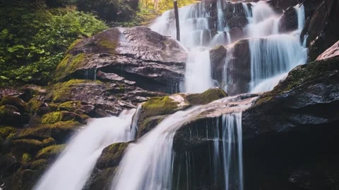 Long exposure time lapse of beautiful cascading waterfall at forest Stock Footage 152716507