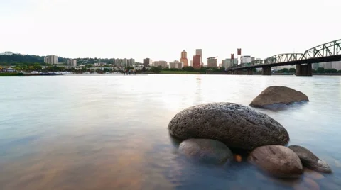 Long exposure time lapse of clouds over city of Porltand Oregon at Sunset 4k uhd Video stock 66525721