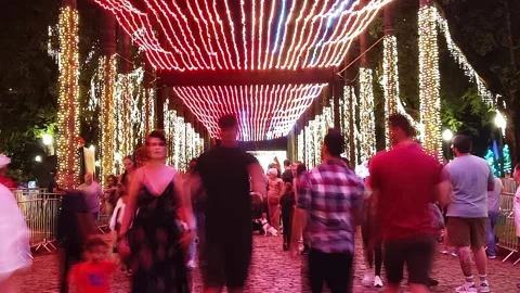 Long exposure time lapse from People in front of christmas lights on praça da Li Stock Footage 297282982