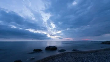 Long Exposure Time Lapse Sunset Blue Hour Smooth Clouds Sky and Beach Stock Footage 85740845