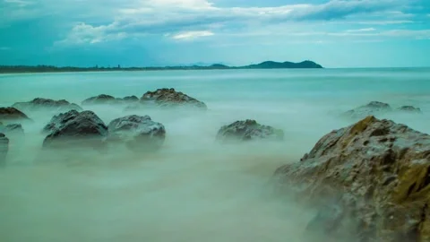 Long Exposure Timelapse Moody Sky Behind Rocks and Waves - Byron Bay Stock Footage