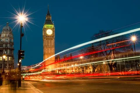 A long exposure of traffic trails through Parliament Square in August 2022 as Stock Illustration
