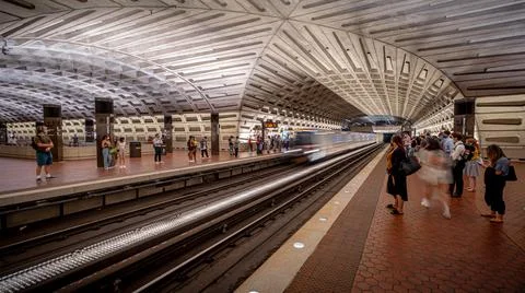 Long exposure of train pulling into Metro Center station Stock Photos