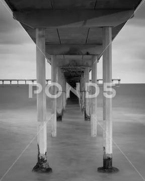 Long exposure under the Ocean Beach Pier in San Diego, California Stock Photos