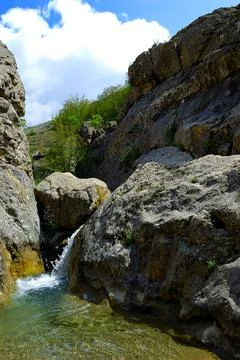Long exposure view of a hidden river in Crimea, Ukraine. A stone set against a Stock Photos