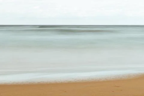 Long exposure view of sandy beach in Spain Stock Photos