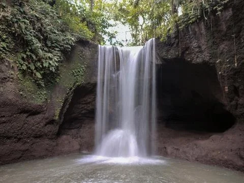 Long exposure of a waterfall in Bali. Called "Suwat Waterfall" Stock Photos