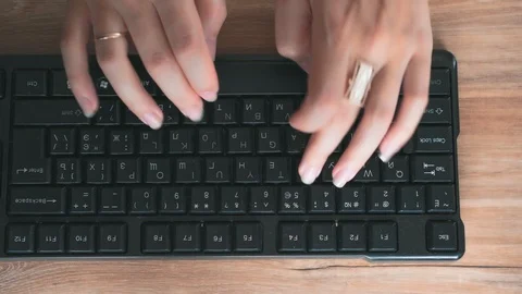 Long fingers type text. Background wooden table. Remote Access Freelancer Jobs Stock Footage 116080607
