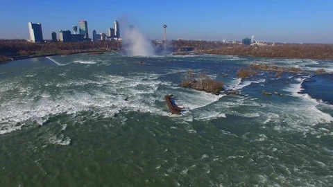 Long flight above Niagara River towards large water falls - 24fps 1080p Stock Footage 104091693