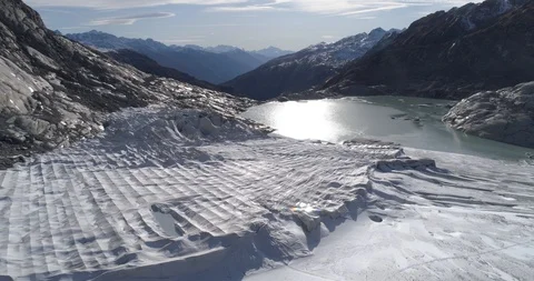 Long flight over Rhonegletscher protected by white overlay - Aerial 4K Stock Footage 118050130