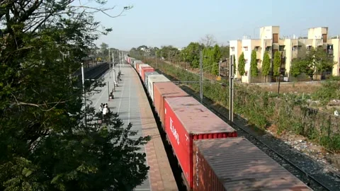Long Freight cargo container Indian railways Train Moving Station Platform India Stock Footage 153159491
