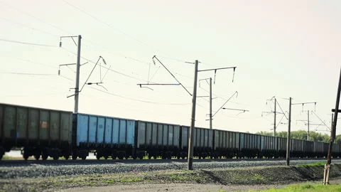 Long Freight Train Traveling on Electrified Railway. Stock Footage 346797894