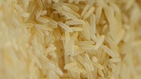 Long grain parboiled basmati rice rotating, vertical shooting 스톡 동영상 268472916