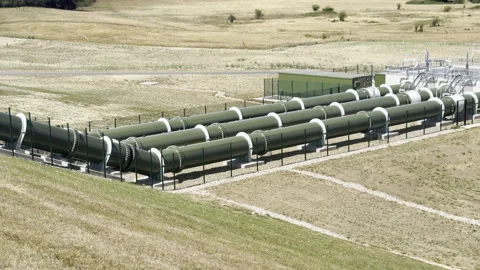 Long green water pipeline infrastructure panning Stock Footage 341833036