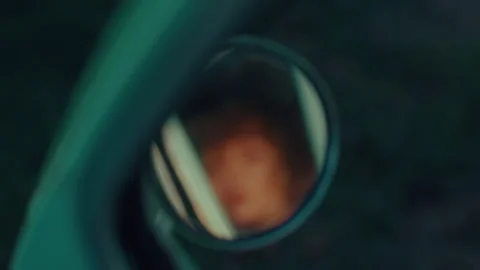 A long-haired blonde is reflected in a retro car mirror 스톡 동영상 246841638