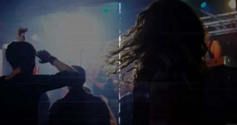 Long-haired fan headbanging as music starting crowd raising arms animated waves Stock Footage 334038431