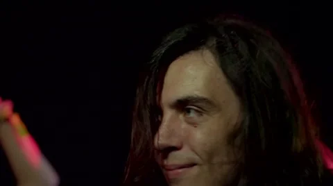 Long-haired man dancing at concert Stock-Footage 63084587