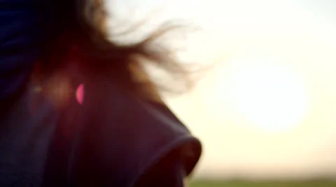 Long-haired man standing in rice field Stock Footage 63077860