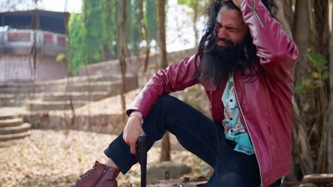 Long haired smuggler cries recalling his past Video stock 303963150