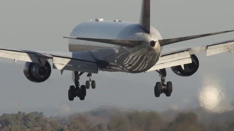 Long Haul twin engine plane landing Stock Footage 89453345