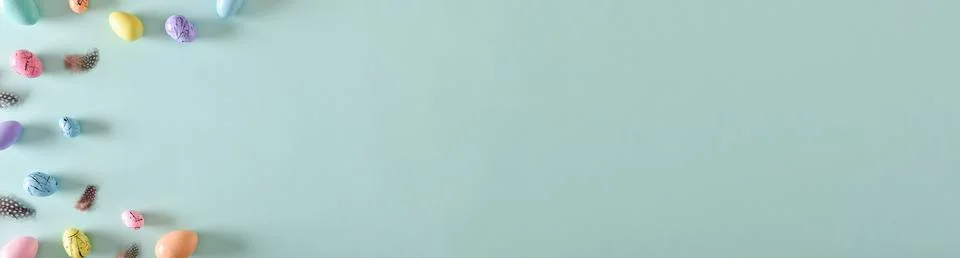 A long horizontal banner for Easter. Copy space. Flat lay, top view. Stock Photos