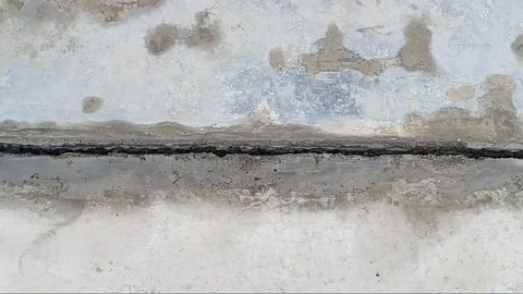 Long Horizontal Crack on Concrete Floor Showing Severe Structural Damage Video stock 321120827
