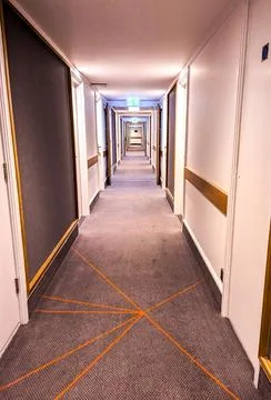 Long Hotel Corridor Stock Photos