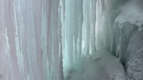 Long icicles in the ice cave Stock Footage 73622286