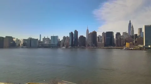 Long Island City ( Queens ) crossing East River towards NYC ( Manhattan) Stock Footage