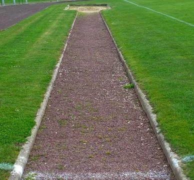 Long jump path on a stadium, front view Stock Photos